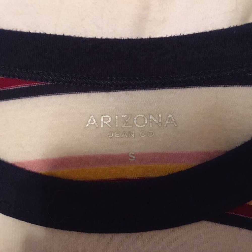 Colorful stripped tee shirt.